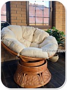 Фото изготовленной подушки на круглое кресло.